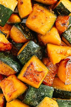 grilled squash and zucchini on a plate with seasoning sprinkles