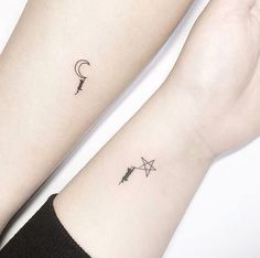 two small tattoos on both arms, one with an arrow and the other with a star