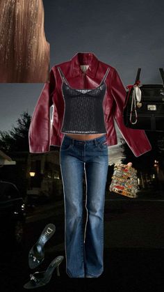 a woman wearing jeans and a red leather jacket