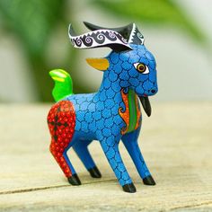 a toy horse with a hat on its head