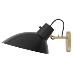 a black and gold wall light on a white background, with the arm extended up