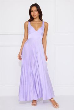 Length from shoulder to hem of size S: 115cm. Chest: 38cm, Waist: 31cm, across front only of size S. Maxi dress. Lined. Model is a standard XS and is wearing size XS. True to size. Non-stretch. Satin. Flowy skirt. Pleated design. Open back with elastic details. V-neck. Zipper. Cold hand wash only. Polyester. The perfect dress for summertime events. The Dazzling Opulence Maxi Dress features a flowy, pleated skirt, a V-neck and an open back with elastic details. Style it with heels and curls for a look we love. Purple Lined Midi Length Dresses, Purple Fitted Maxi Dress For Casual Occasions, Fitted Purple Maxi Dress For Casual Occasions, Fitted Sleeveless Pleated Dress For Evening, Purple A-line Summer Evening Dress, Purple A-line Evening Dress For Summer, Purple Party Dress With Pleated Bodice, Summer Evening Dresses In Purple, Spring Party Evening Dress With Pleated Back