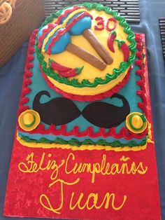 a birthday cake for someone's 13th birthday with mustaches and moustaches on it