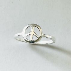 Perfect Gift Idea For Any Occasion: Birthday, Anniversary, Engagement, Graduation, Bridesmaid, Mother’s Day, Valentine’s Day, Christmas, Promise. Freedom Or A Period Of Freedom From Public Disturbance Or War, A Quiet And Calm State Of Mind, Agreement And Harmony Among People, Peace Sign Family Love. Sterling Silver Peace Sign Ring, Silver Ring, A Symbol Of Peace, Silver Ring, Hippie Ring, Statement Ring May Also Be Worn As A Midi Ring, Or As A Toe Ring. Face Height: 10 Mm Metal Material: Sterlin Peace Sign Ring, Peace Sign Jewelry, Peace Ring, Hippie Ring, Hippie Rings, Midi Ring, Toe Ring, Ring Promise, Love Ring