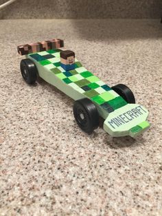 a toy race car made out of lego blocks