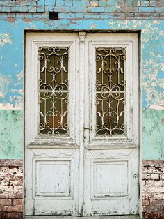 Rustic Vintage Door Photography Backdrop - Photography backdrop featuring a rustic wooden door with wrought iron details and a distressed pastel-colored wall Door Backdrop, Portable Backdrop, Door Photography, Door Backdrops, Distressed Walls, Paper Backdrop, Peeling Paint, Vinyl Backdrops, Printed Backdrops