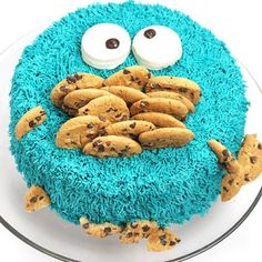 a cookie monster cake with chocolate chip cookies on top