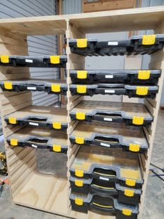 the shelves are filled with many different types of toolboxes and other storage bins