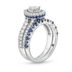 a diamond and blue sapphire wedding ring set with matching bands on the band, in 18k white gold