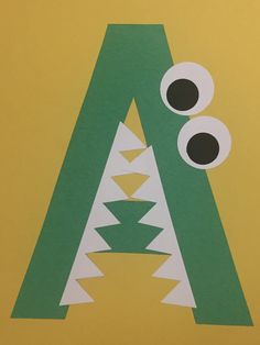 the letter a is made up of paper with eyes