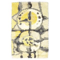 a yellow and black rug with an animal on it