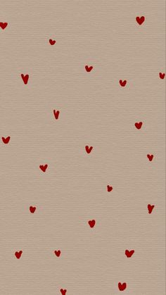 red hearts flying in the air on a beige background