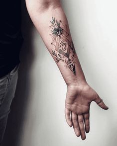 a person with a tattoo on their arm