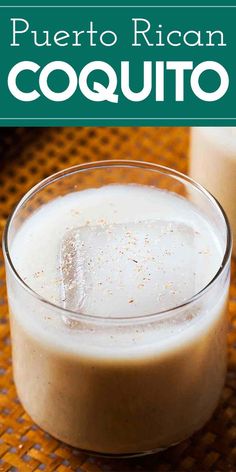 a close up of a drink in a glass with the words puerto rican coquito