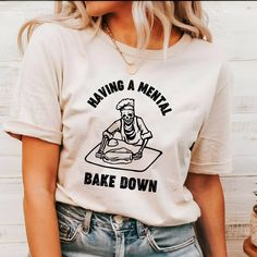 "Having A Mental Bake Down Shirt, Gift For Bakers,  Skeleton Chef Shirt,  Chef Halloween Shirt,  Funny Baking Shirt, Halloween Chef Shirt,  Our T-shirts are made from premium materials and printed using advanced technology to ensure exceptional quality and comfort. Features: Premium brand: Gildan Soft Style Professionally printed using advanced technology Unisex size for a comfortable fit Made from soft, breathable cotton for all-day comfort Durable construction to withstand repeated wear and tear Easy Ordering: 1.Browse our design options. 2.Choose your size and color. 3.Choose the quantity you want. 4.Click \"Add to Cart\" to complete your purchase. Order Fulfillment: 💍Production time: 1-2 business days 💍Shipping time: 3-5 working days after production Return Policy: 💍Returns and exch If You Give A Mouse A Cookie Shirt, Funny Food Shirts, Bakery Shirts Design, Funny Shirt Designs, Funny Baking Shirts, Chef Shirt, Funny Baking, Baking Humor, Baker Shirts