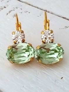 "Mint earrings, Mint dangle earrings, European earrings, Mint drop earrings, Bridal earrings, Bridesmaid gifts,Gold earrings,Crystal earring THESE EARRINGS CAN BE CUSTOM MADE WITH YOUR REQUEST FOR OTHER COLORS -Please just contact me. Elegant and refined. These would be great as bridal earrings or for any available other day. Perfect gift for bridesmaids or other occasions. They are made of gold plated plated brass and Swarovski crystals, set in prong setting. Made with CRYSTALLIZED™ - European Fantasy Accessories, Drop Earrings Bridal, Mint Green Earrings, Bridal Earrings Studs, Mint Earrings, Bridal Earrings Pearl, Earrings Bridesmaid, Earrings Crystal, Pretty Stuff