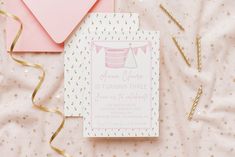 a pink and white birthday party with gold confetti