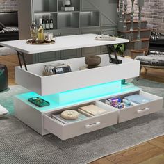 a modern coffee table with drawers and lights