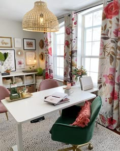 the instagram page on instagram shows an image of a living room with pink chairs and