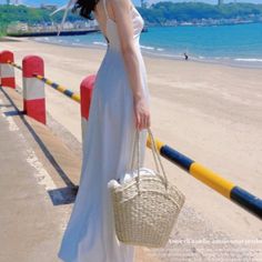 The SUMMER straw handbag has adorable shell bag with dot printed lining correspond to mini scarf attached to handle have every lovely day. Sand-colored Straw Bag For Summer Beach, Summer Sand-colored Straw Bag, Chic Sand-colored Summer Shoulder Bag, Beige Bags With Bamboo Handle For Summer, Chic Beach Bags With Bamboo Handle, Cream Straw Bag For Beach Vacation, Summer Beige Straw Bag For Day Out, Chic Beige Straw Bag For Picnic, Summer Vacation Bags With Bamboo Handle