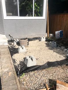 the back yard has been laid up and ready to be used as a garden bed