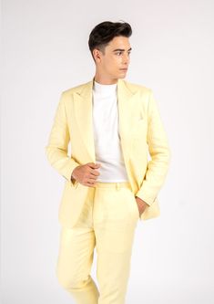 Experience true elegance in this Liberty Light Yellow Linen Suit. Handcrafted from 100% linen, this eye-catching custom made suit will make you look and feel like a million bucks with its bright and stylish summer vibes. Perfect for stand out occasions, your exquisite outfit will turn heads. Slim Fit Linen Suit With Notch Lapel, Slim Fit Linen Suits With Notch Lapel, Semi-formal Summer Sets With Notch Lapel, Classic Slim Fit Summer Blazer, Classic Summer Slim Fit Blazer, Notch Lapel Sets For Summer Workwear, Summer Notch Lapel Workwear Sets, Classic Summer Sets With Notch Lapel, Notch Lapel Summer Sets For Workwear