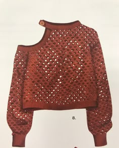 an old sweater with holes on it and a pair of red shoes next to it