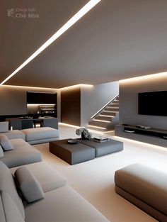 a modern living room with white couches and stairs