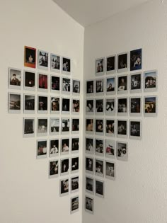 a white wall with many pictures arranged in the shape of a heart on it's side