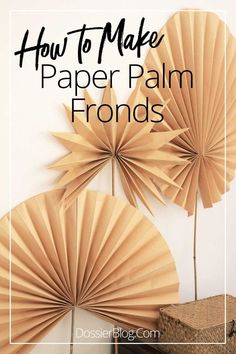 how to make paper palm fronds with text overlay that reads, how to make paper palm fronds