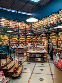 the inside of a library filled with lots of books