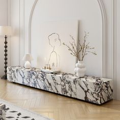 a white and black marble console table in a living room