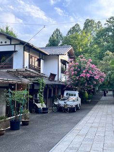 a white van parked in front of a house