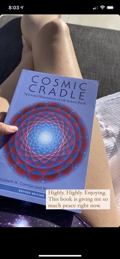 someone is reading a book about cosmic raddle