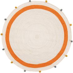 an orange and white round rug on a white floor with dots in the middle,