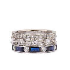 three bands of white gold and blue sapphires with diamonds on each band, all in different sizes