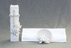 a table setting with a napkin and candle holder