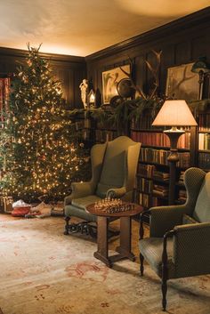 a living room filled with furniture and a christmas tree