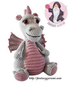 a crocheted dragon stuffed animal sitting on top of a white background with the words,