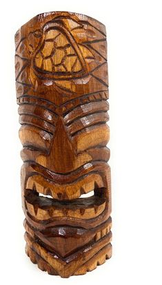 a wooden tiki mask is shown on a white background