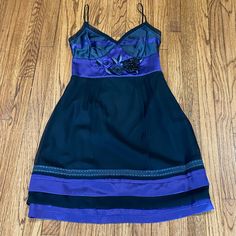 Moschino Cheap & Chic Black And Purple Gorgeous Party Dress. Spaghetti Straps. Waist Has A Embroidered Floral Design. Side Zipper. Us 8; Gb 10; F 38 Armpit To Armpit: 34” Waist: 28” Length: 35” This Is A Stunning Dress To Wear To A Party!! I Bought It And Never Had The Opportunity To Wear It And Then It Didn’t Fit Me Anymore!! I Shortened The Shoulder Strap A Little. But There Is 3-4” More Room To Lengthen It. If You Need It. Purple Black Party, Moschino Dress, Black Party Dress, Dress Spaghetti Straps, Moschino Cheap And Chic, Black Party Dresses, Black And Purple, Black Party, Stunning Dresses