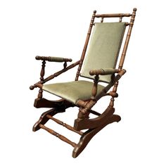 a wooden rocking chair with green fabric on the seat and backrest, viewed from the front