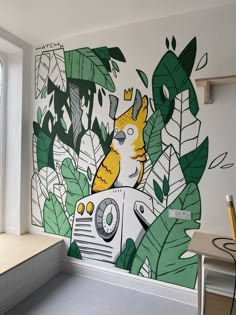 a room with a large mural painted on the wall