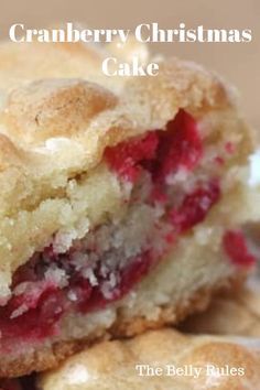 a cranberry christmas cake cut in half on a plate with the words, the belly rules