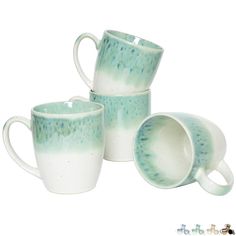 three coffee mugs sitting next to each other on a white surface with blue speckles