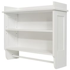 a white book shelf with two open shelves