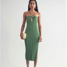 Cut From Ribbed Knit And Draped To A Figure Flattering Silhouette, The Elfreda Knit Dress Is Defined Through The Twisted Bodice Detail For An Elevated, Yet Whimsical Flair. - Lightweight Ribbed Knit Fabrication; Generous Stretch - Halter Neckline - Centre-Front Cut-Out - Twisted Bodice Detail - Side Split To Hem New With Tags Chic Green Knit Midi Dress, Green Knit Party Dress, Green Knit Midi Dress For Spring, Knitted Midi Length Party Dresses, Elegant Green Knit Midi Dress, Green Ribbed Knit Dress, Chic Knitted Midi Dresses, Chic Green Knitted Dress, Elegant Fitted Green Crochet Dress