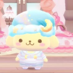 an animal crossing game character standing in front of a cake