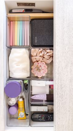 an organized drawer with various items in it