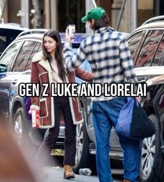 a man and woman standing next to each other in front of parked cars with the caption gen z luke and lorelia